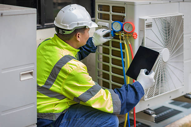Professional Air Duct Cleaning technician working in Palm Springs, FL